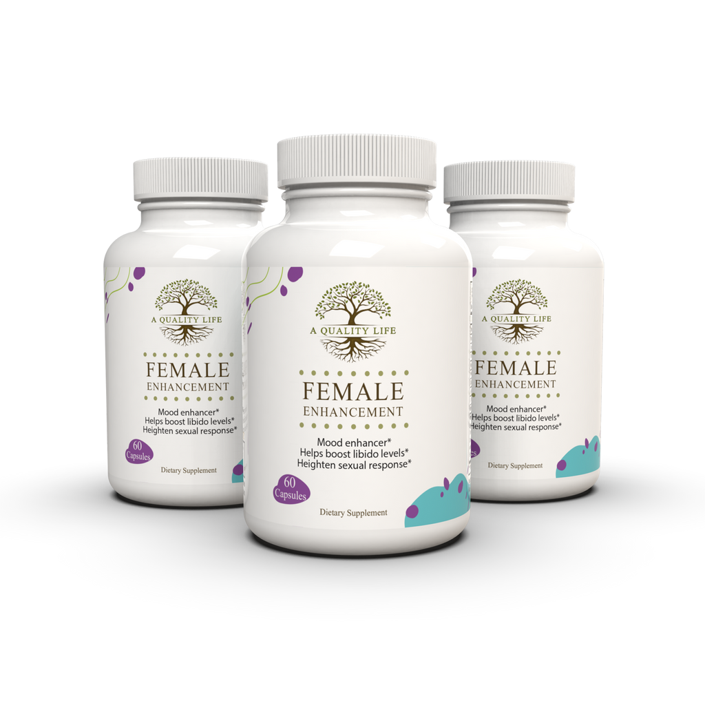 Three bottles of 'Female Enhancement' supplements on a white background