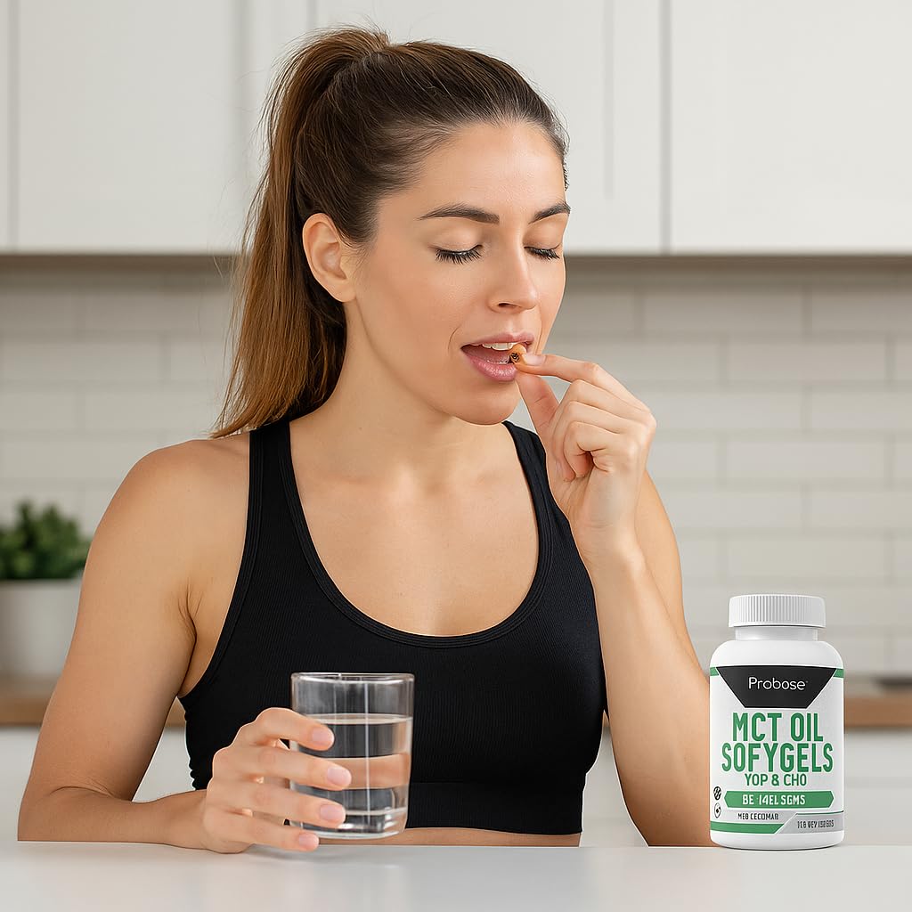Woman taking a supplement with a glass of water in a kitchen setting