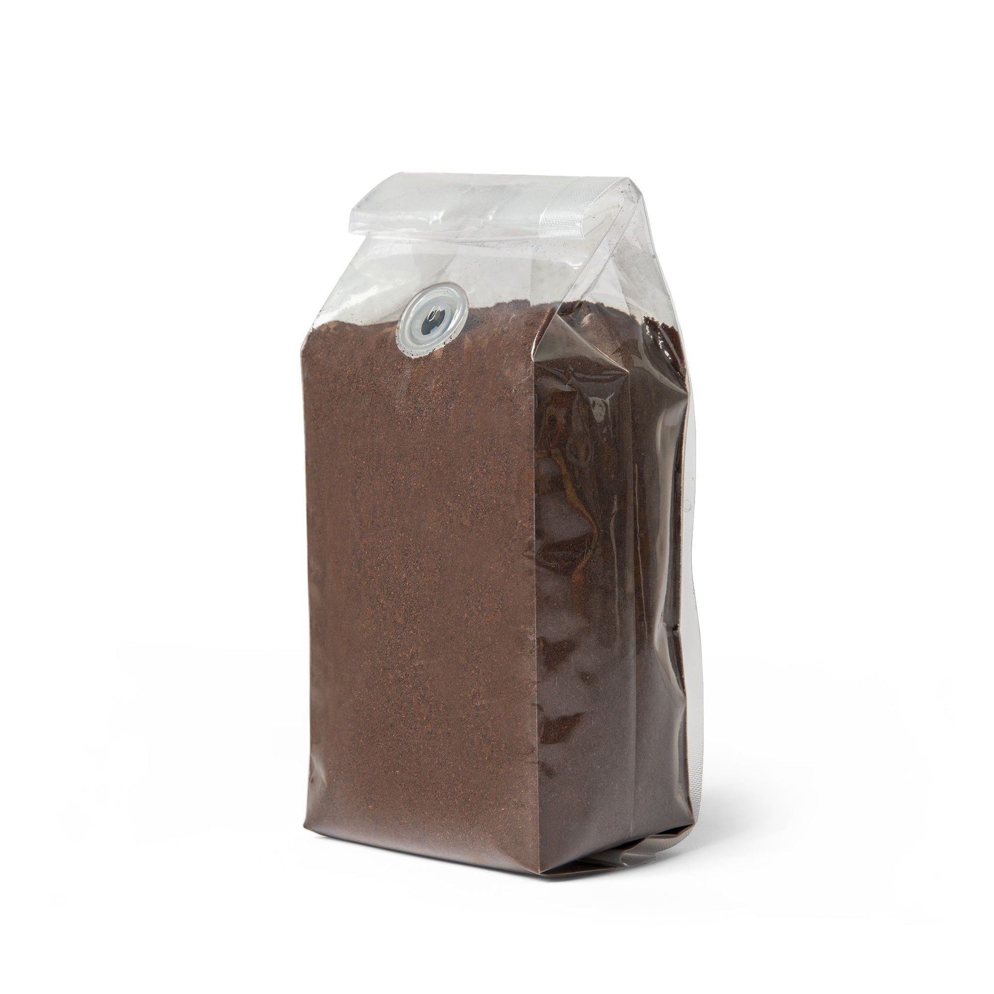 Brown sand bag with clear top on a white background