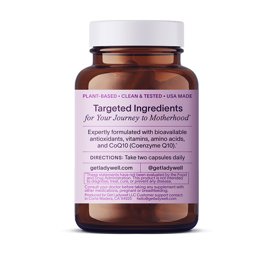Vitamins bottle with purple label on a white background