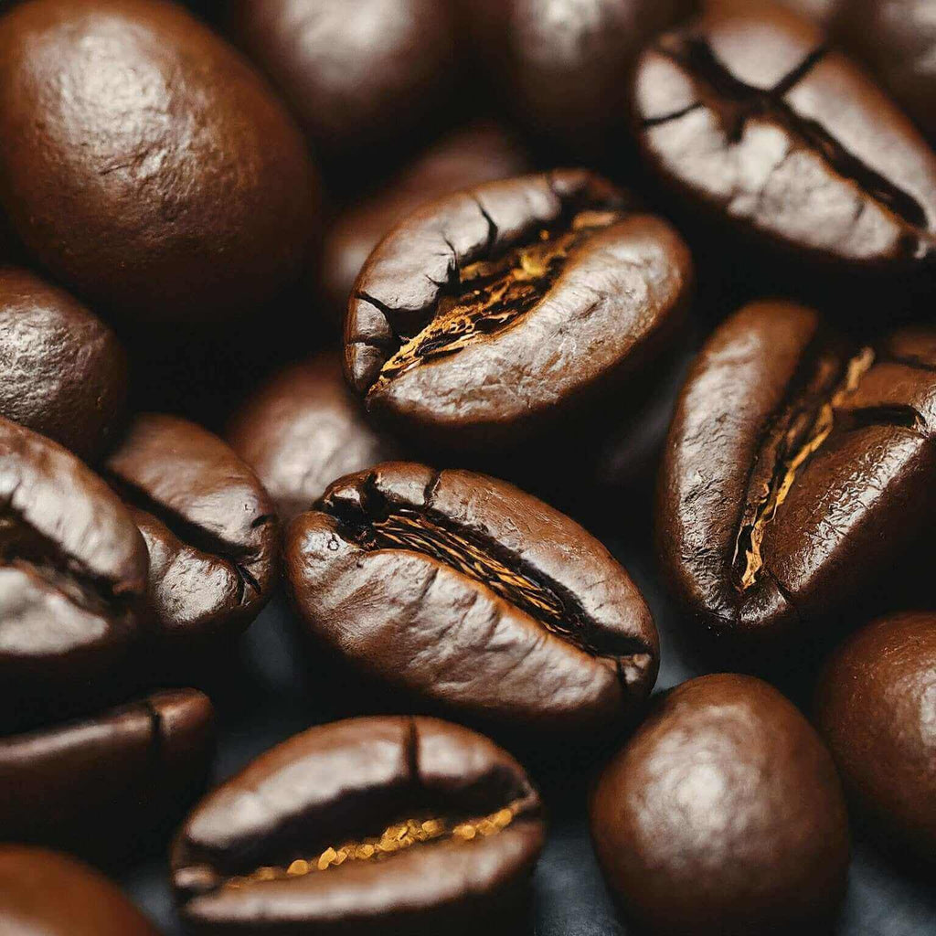 Close-up of roasted coffee beans with a dark background