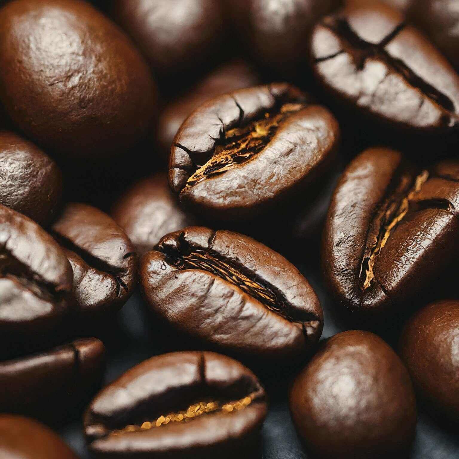 Close-up of roasted coffee beans with a dark background