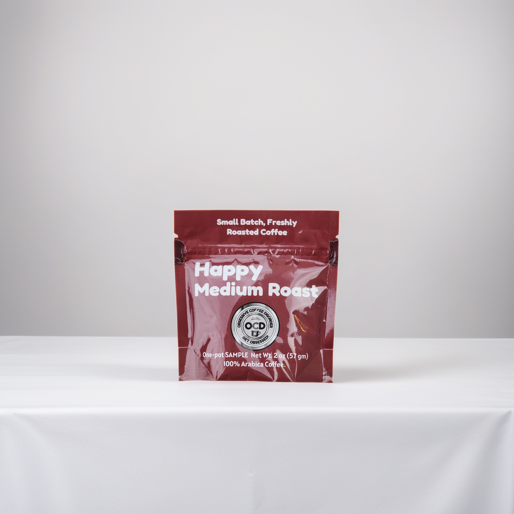 Red coffee packaging with white text on a white background