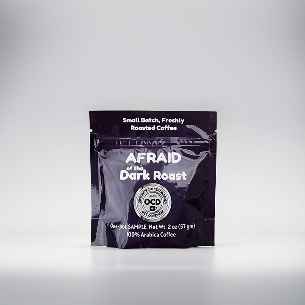 Coffee package labeled 'Afraid of the Dark Roast' on a gray background