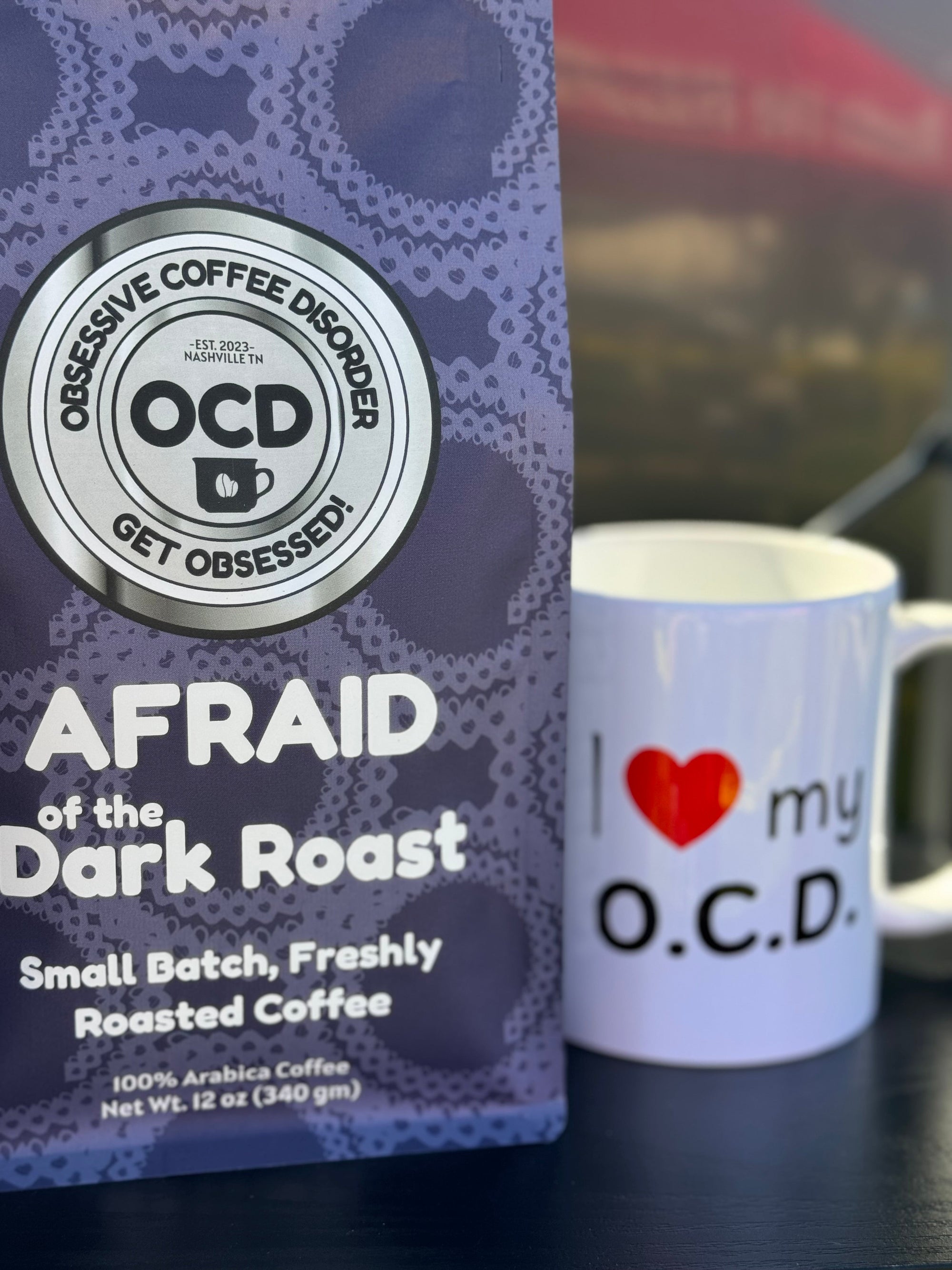 Coffee package labeled 'Obsessive Coffee Disorder' with a mug featuring 'I love my O.C.D.' text.