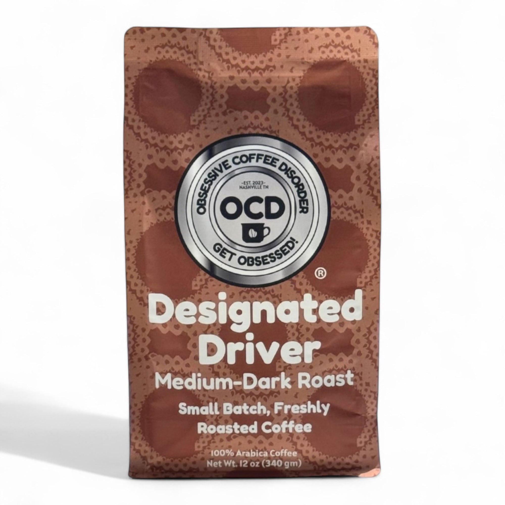 Coffee bag labeled 'Designated Driver' by OCD on a white background