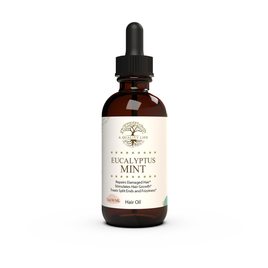Bottle of Eucalyptus Mint hair oil with a dropper on a white background