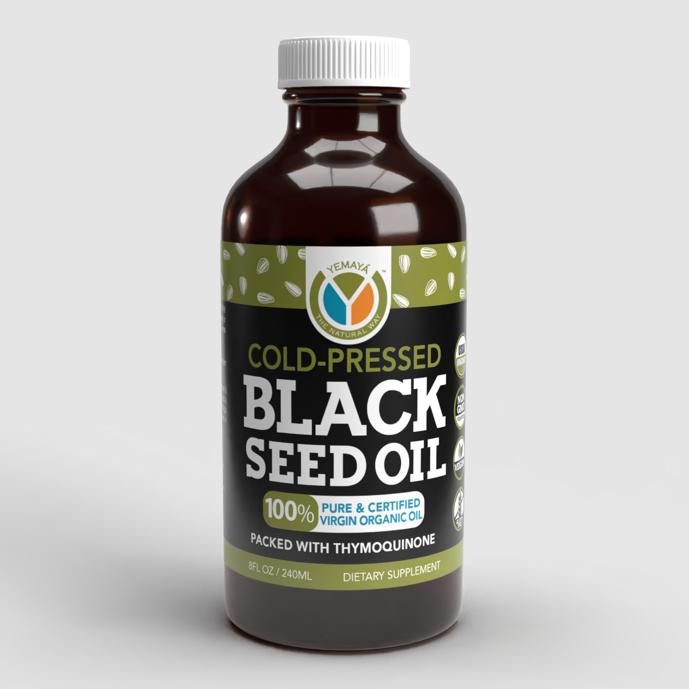 Bottle of black seed oil with a label on a light gray background