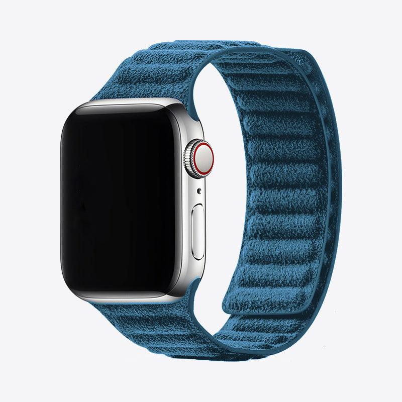 Smartwatch with a blue textured band on a white background
