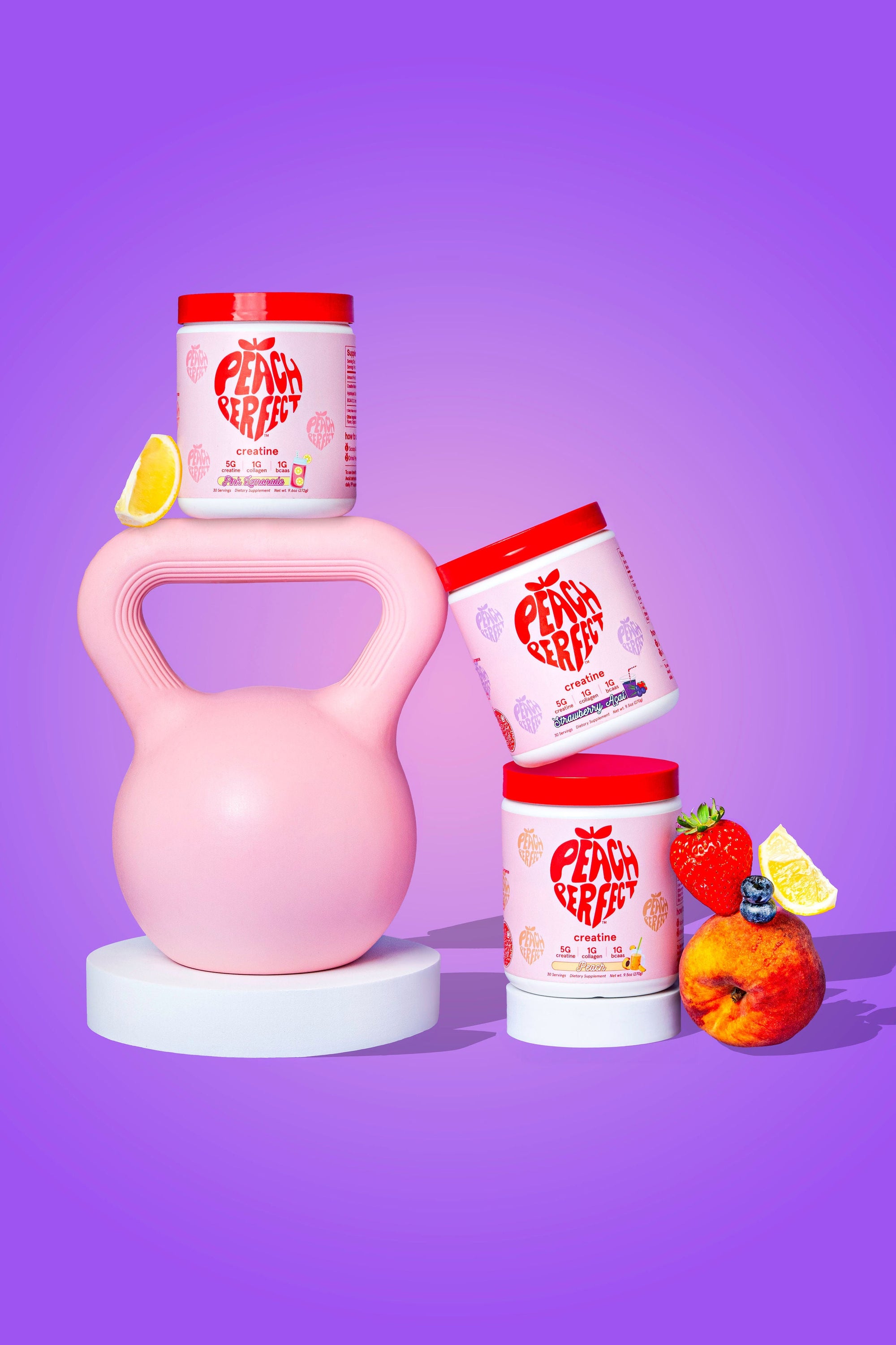 Pink kettlebell with containers of 'Pump King' supplement on a purple background