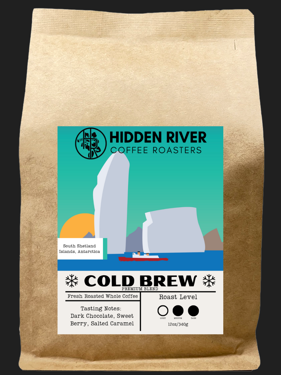Coffee bag with 'Hidden River Coffee Roasters' label on a black background