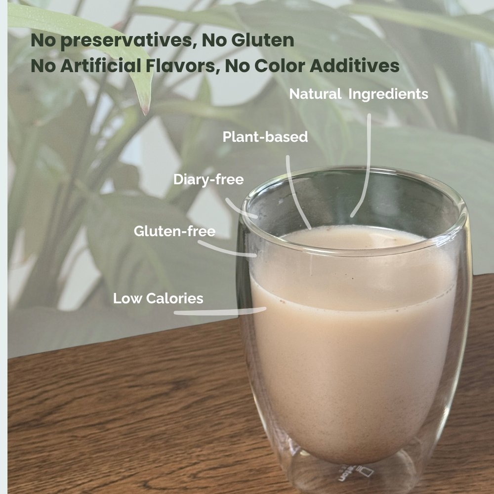 Glass of plant-based drink on a wooden table with health benefits text overlay.