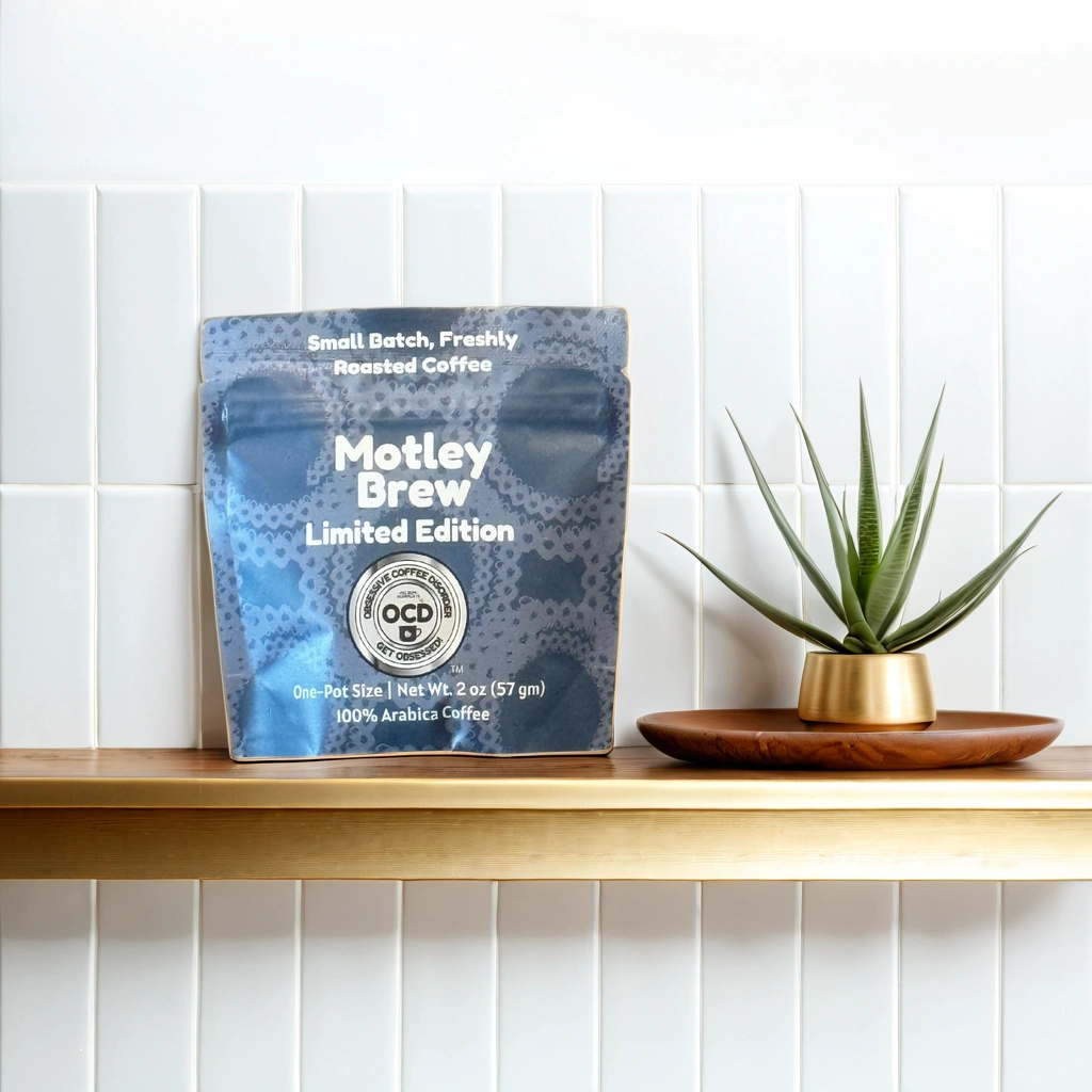 Motley Brew coffee package on a wooden shelf with a plant