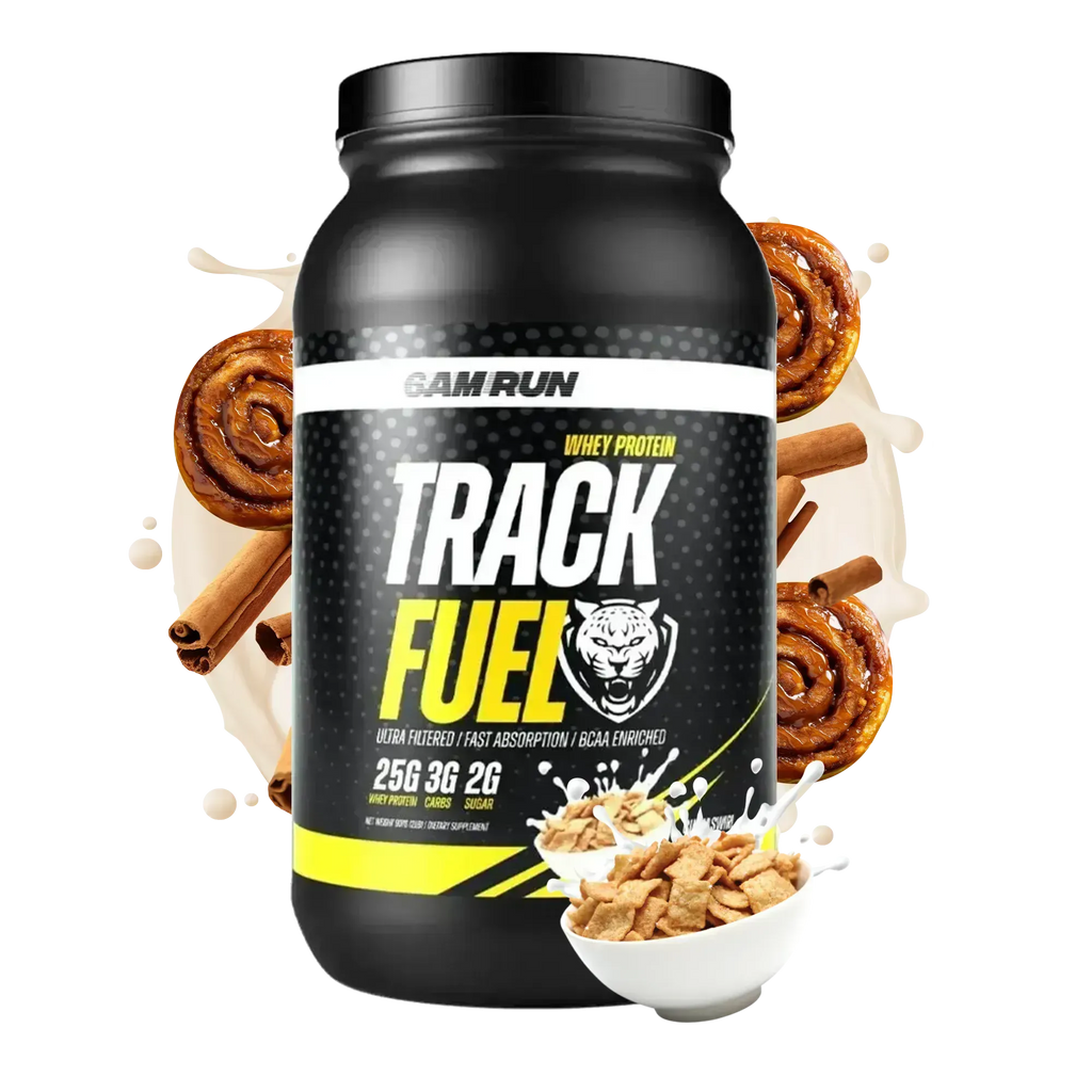 Black protein supplement container labeled 'Track Fuel' with cinnamon rolls and cereal in the background.